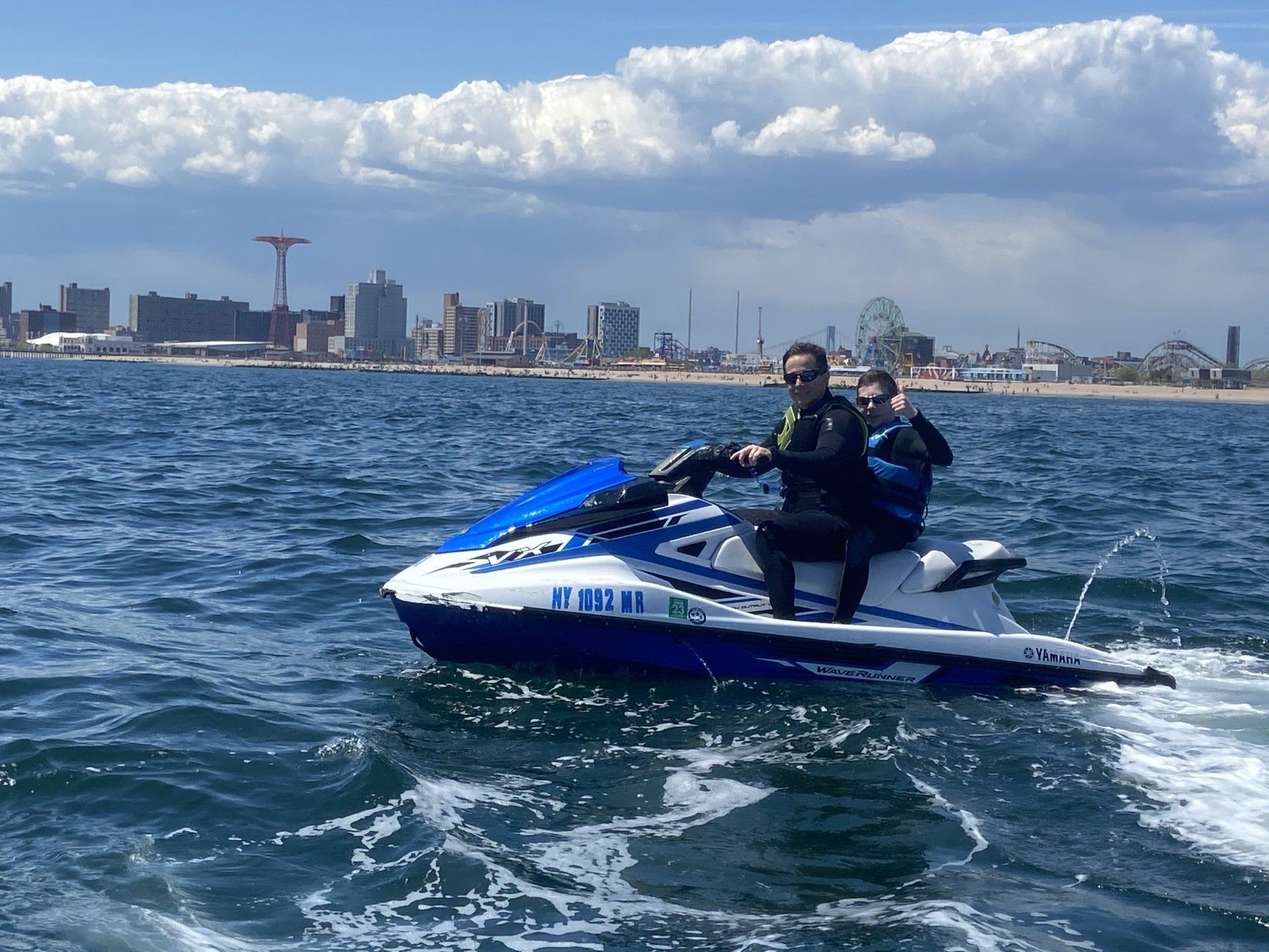 couple on blue jet ski
