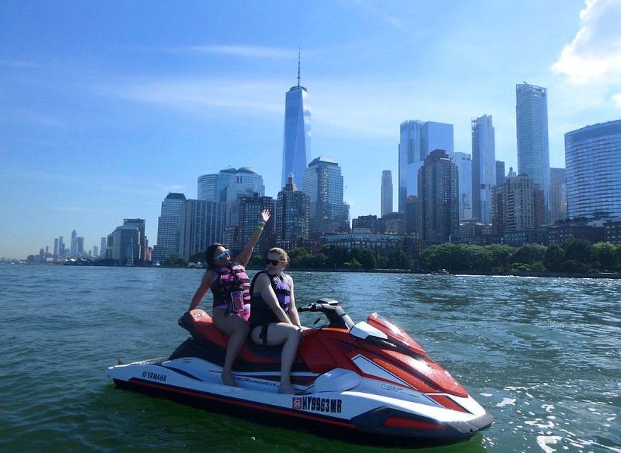 girls enjoying riding on jet ski in New York