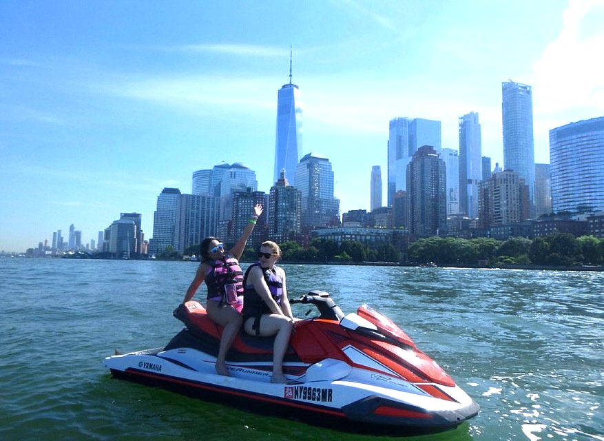 man enjoying riding jet ski