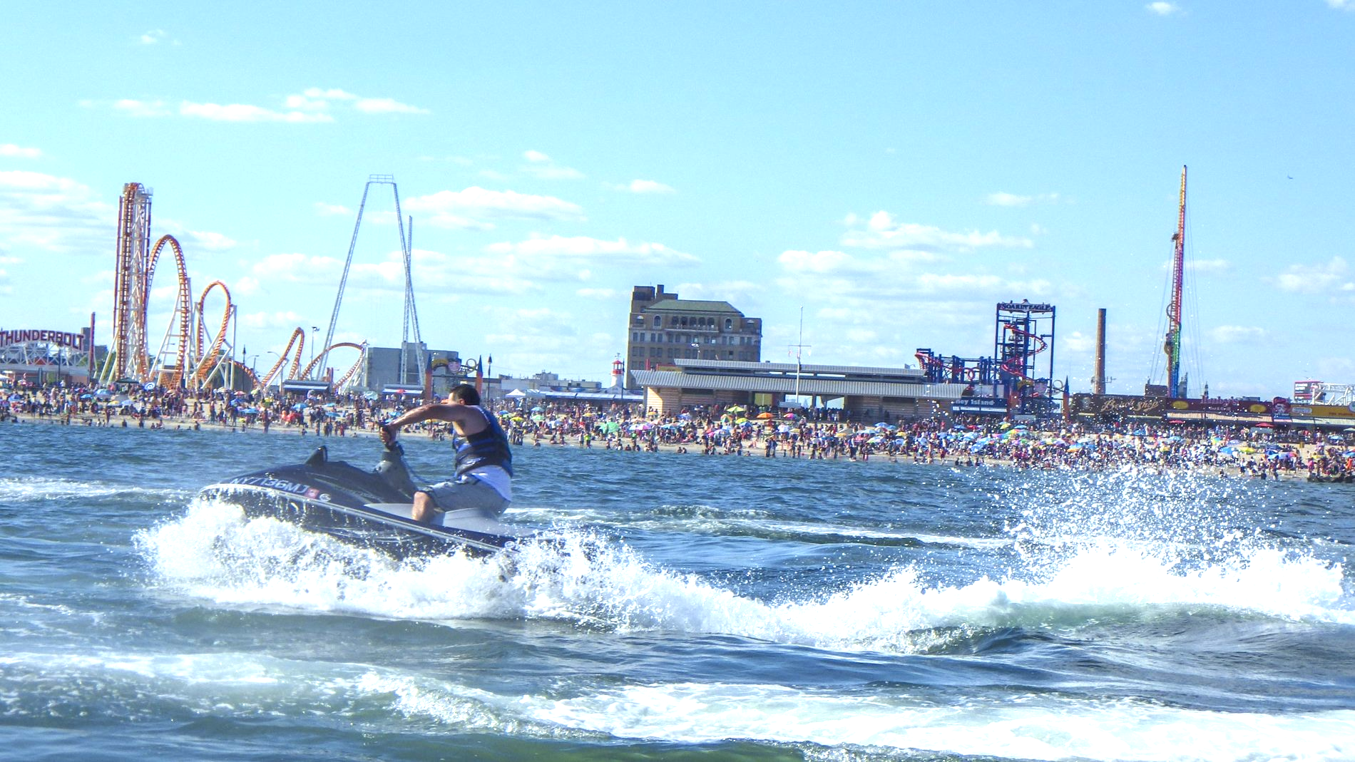 man creating waves with jet ski in new york