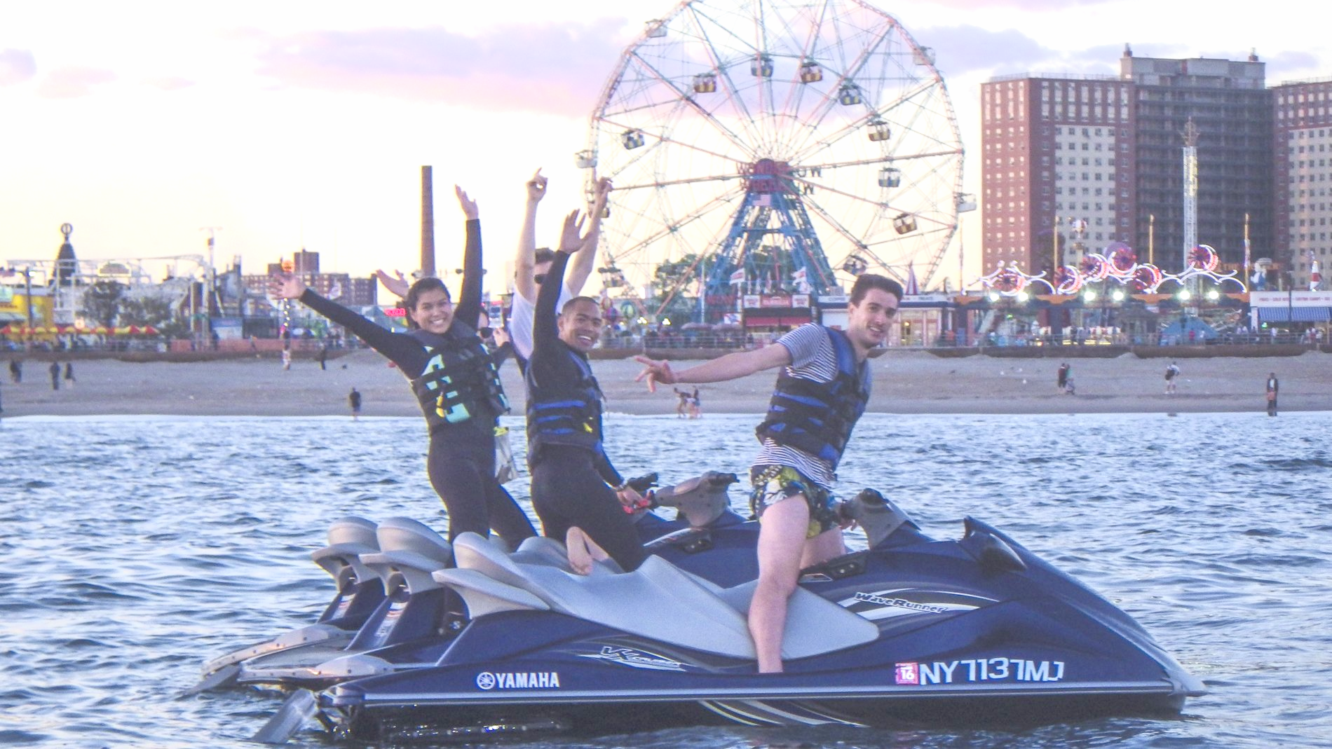 group of people enjoying riding jet ski