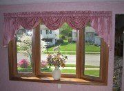 Window with pink curtain - Window in Erie, PA