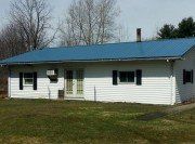 Blue roof - Window in Erie, PA