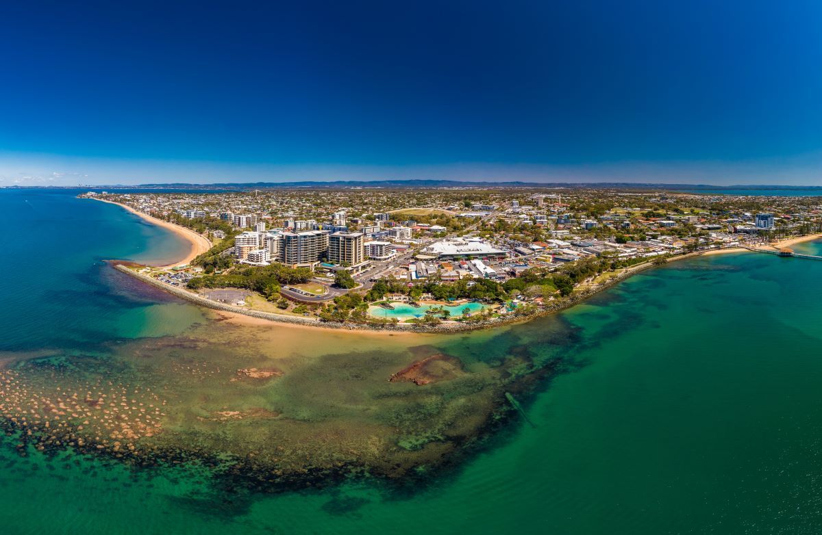 An Aerial View of a City on a Small Island in the Middle of the Ocean — Top Shelf Glass Pool Fencing & Balustrading in Brisbane, QLD