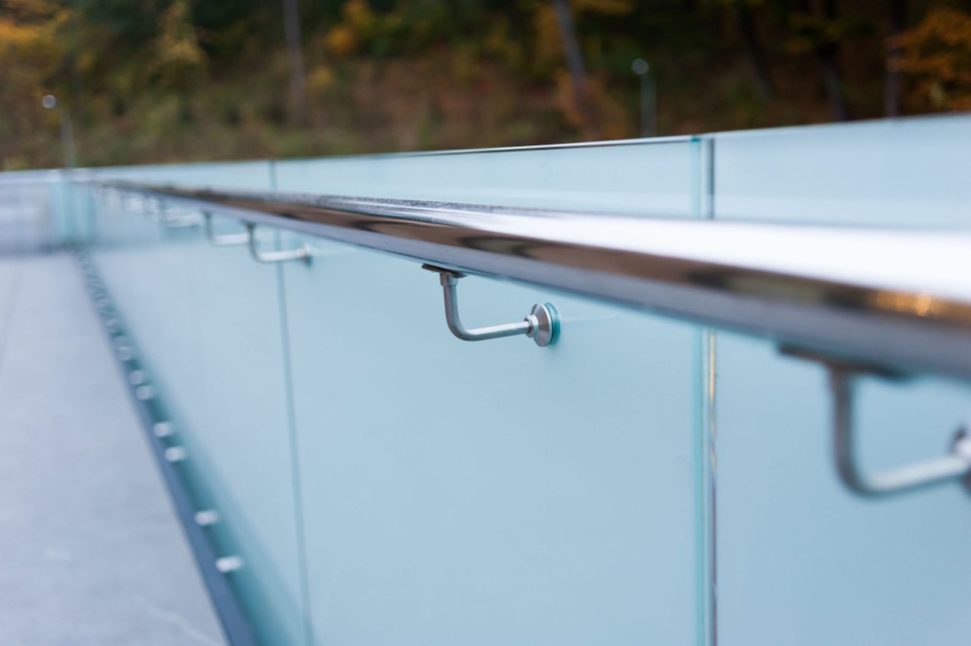 A Close Up of a Glass Railing on a Bridge — Top Shelf Glass Pool Fencing & Balustrading in Tweed Heads, QLD