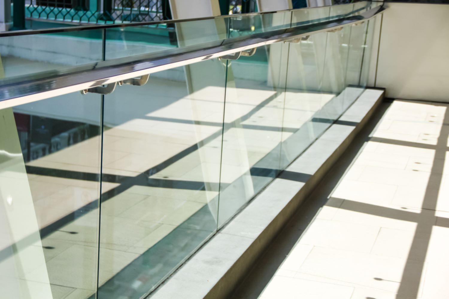 A Glass Railing on a Staircase in a Mall — Top Shelf Glass Pool Fencing & Balustrading in Helensvale, QLD