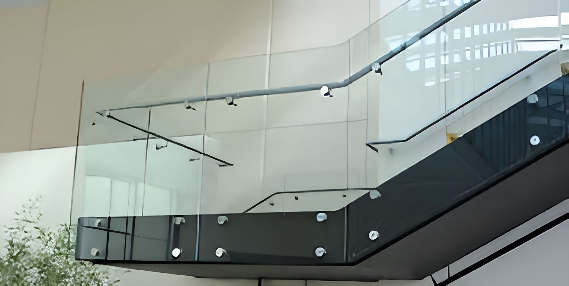 A Staircase With a Glass Railing in a Building — Top Shelf Glass Pool Fencing & Balustrading in Merrimac, QLD