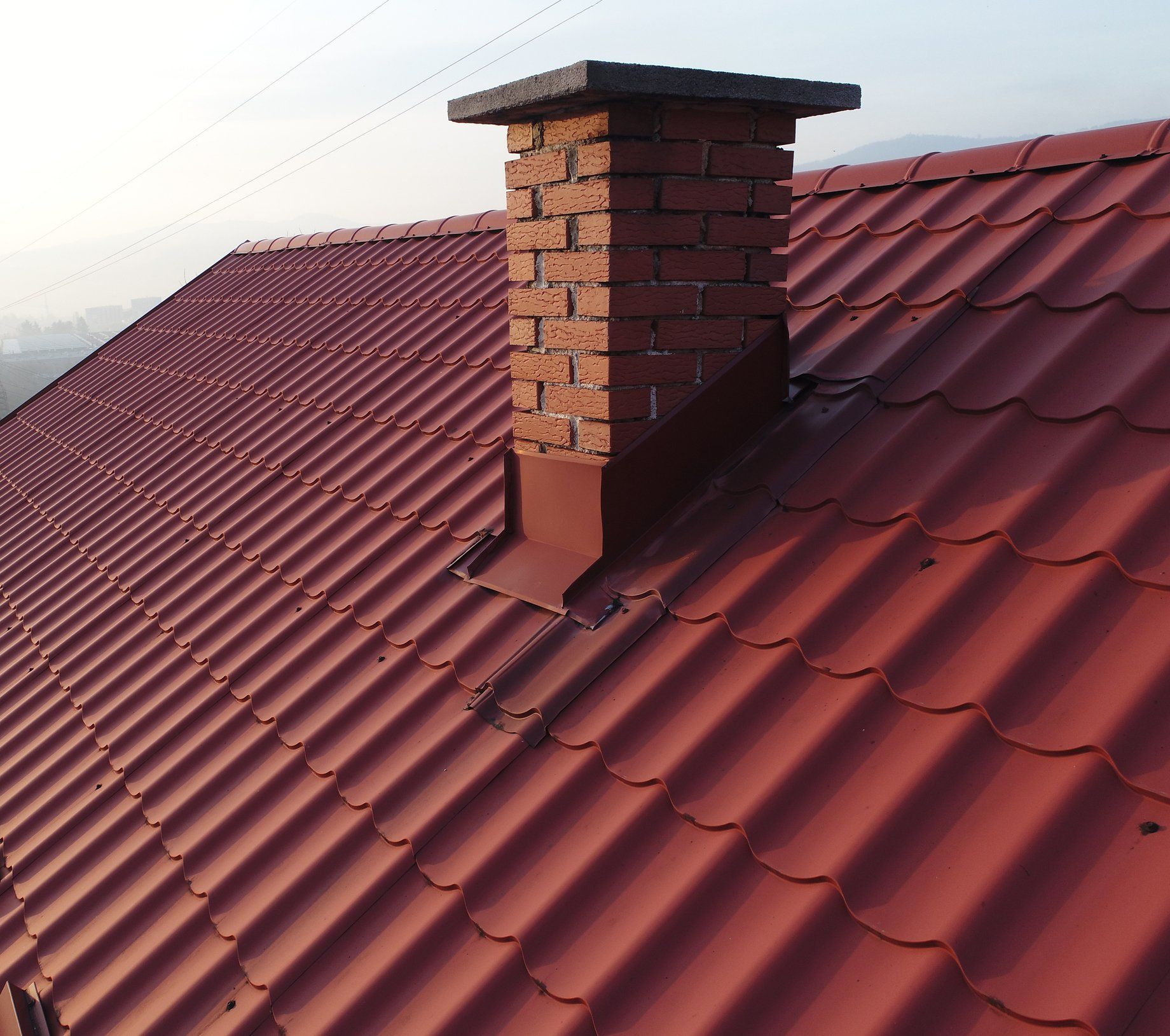 Roof With Chimney — Cranbrook, QLD — Ehrmann Painting Roof With Chimney — Cranbrook, QLD — Ehrmann Painting