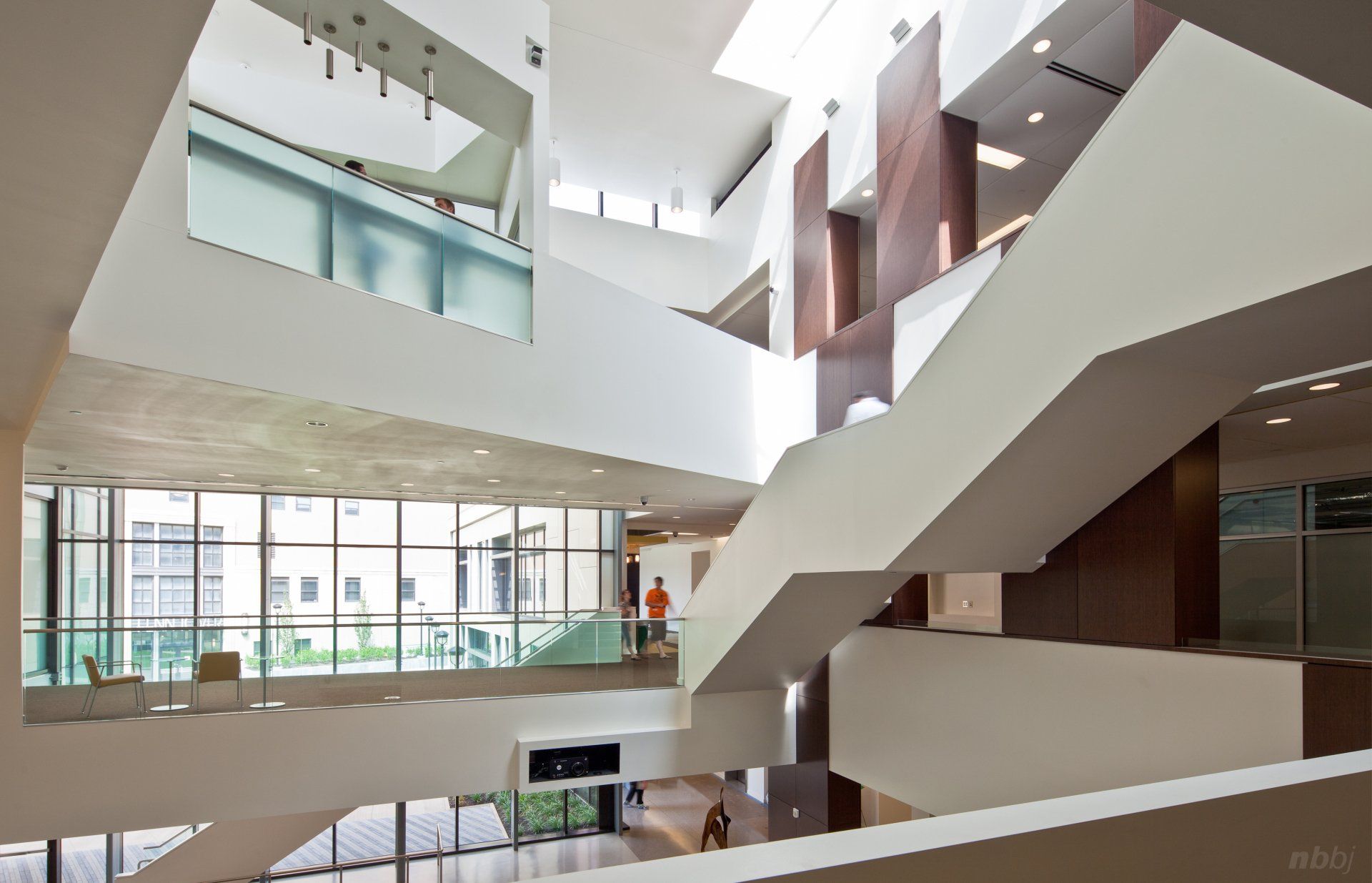 A large building with a lot of windows and stairs