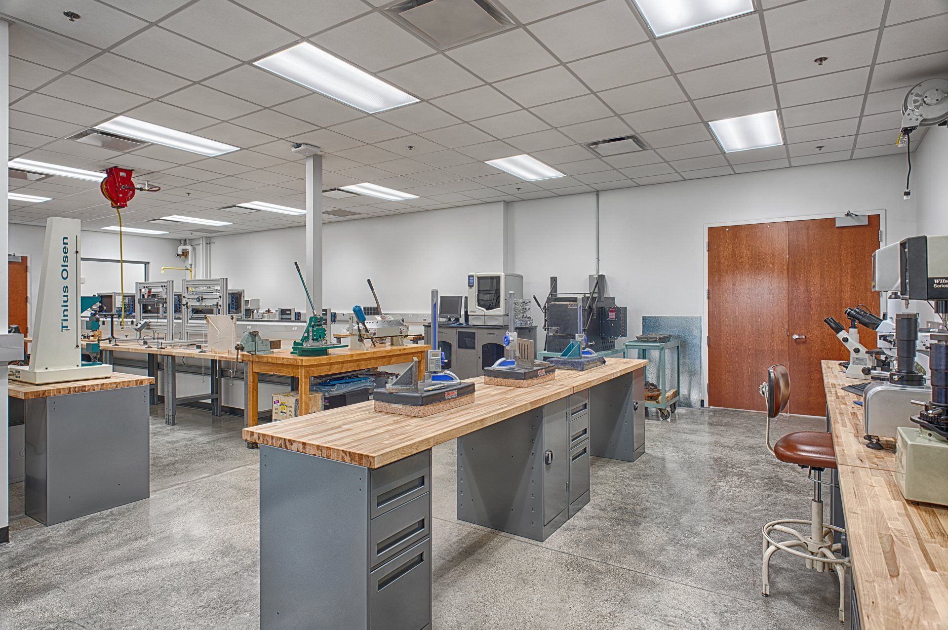 A large room with a lot of tables and machinery