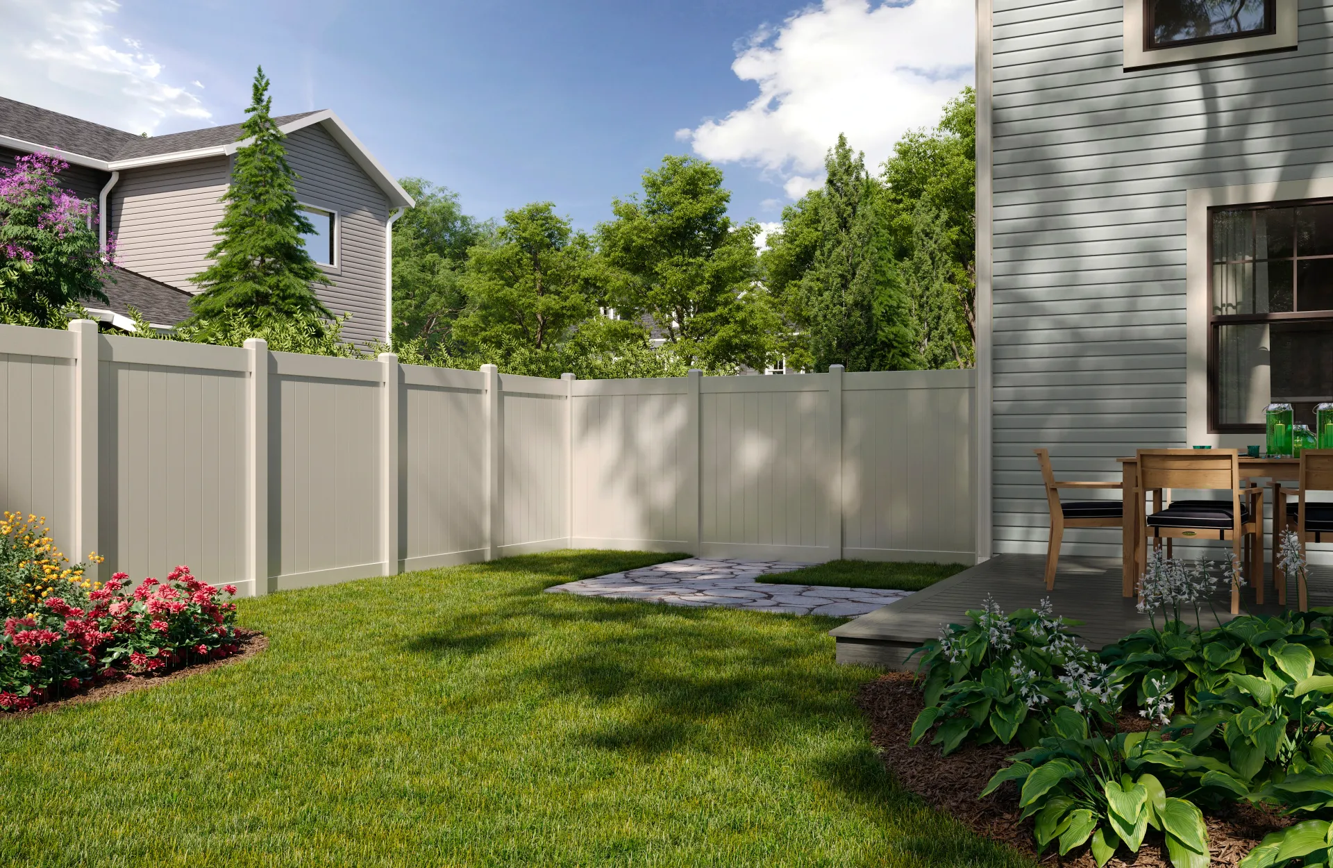 A tan vinyl fence encloses a grassy backyard with a house and trees in the background.