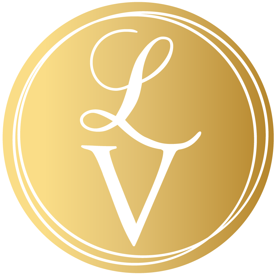 A gold circle with a white letter v inside of it.