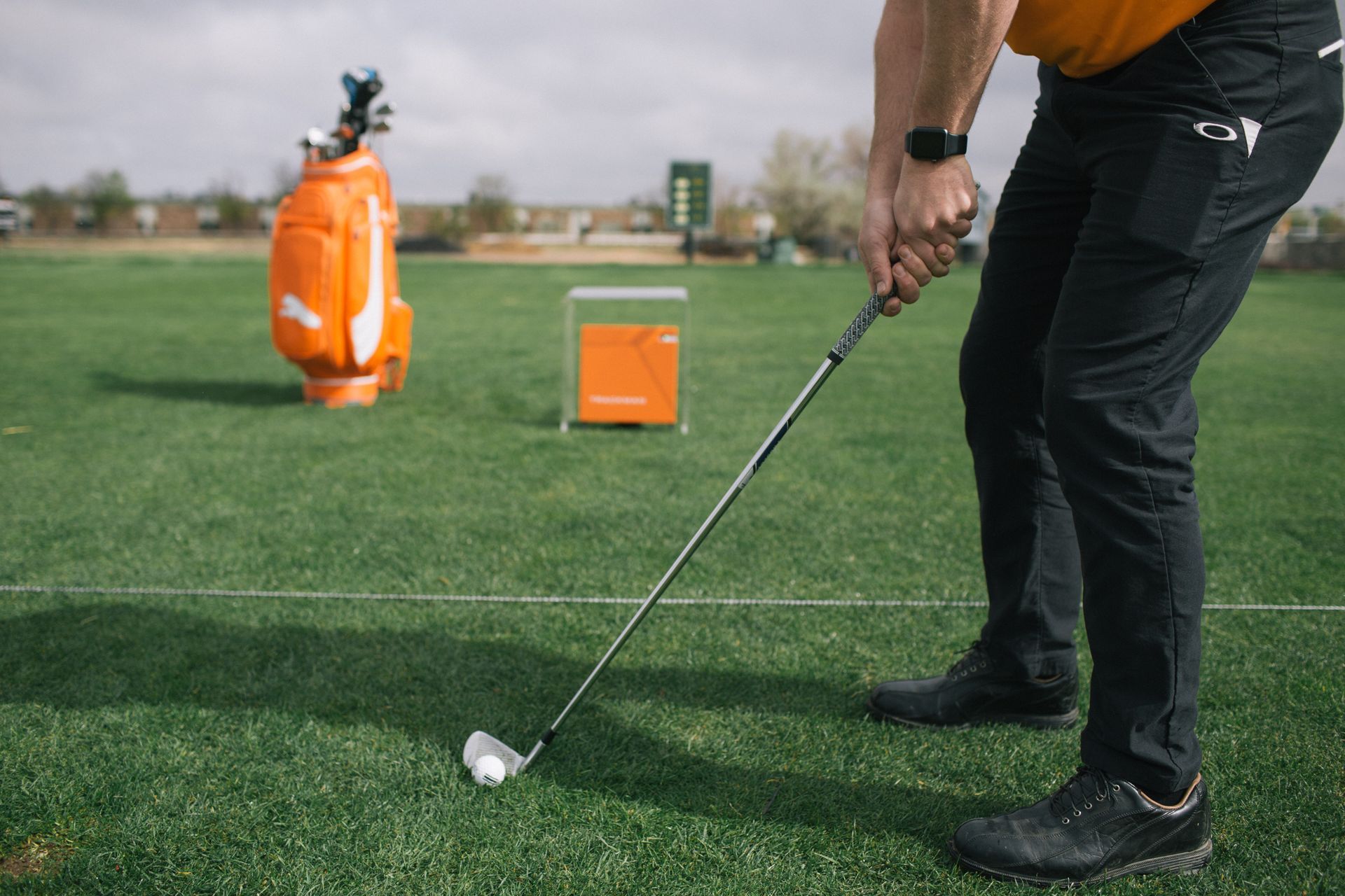 Troy Sidabras using trackman in golf field
