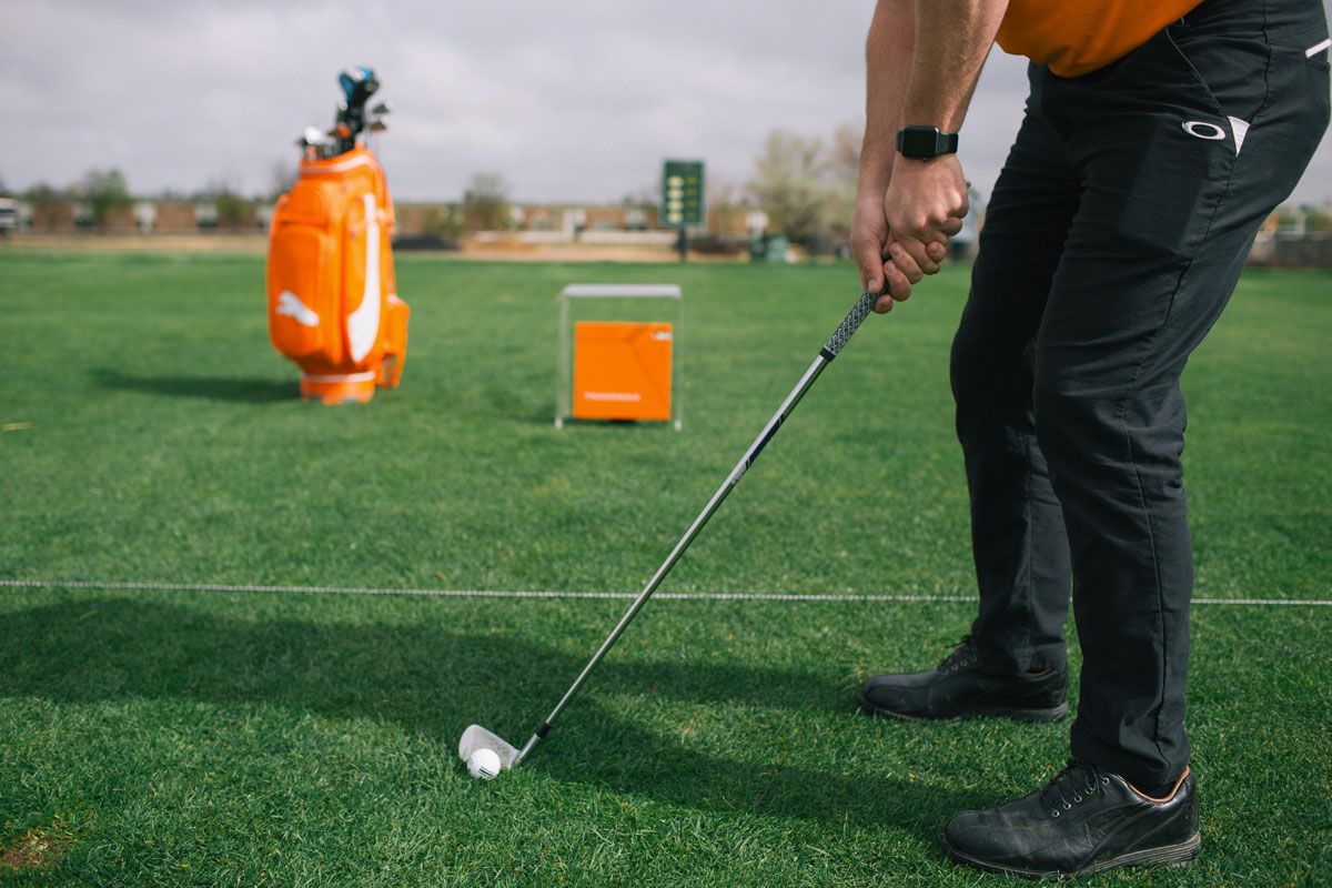 Golfer using trackman technology