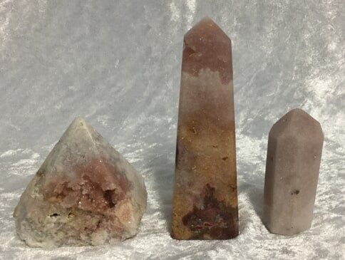 Three Distinct Types of Rocks Displayed on A White Surface — Crystal Cauldron In South Mackay, QLD