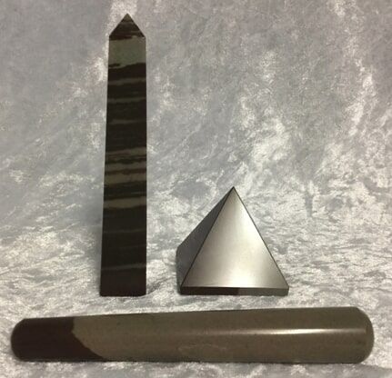 A Black and White Image Featuring a Pyramid, a Triangle, and A Stone — Crystal Cauldron In South Mackay, QLD