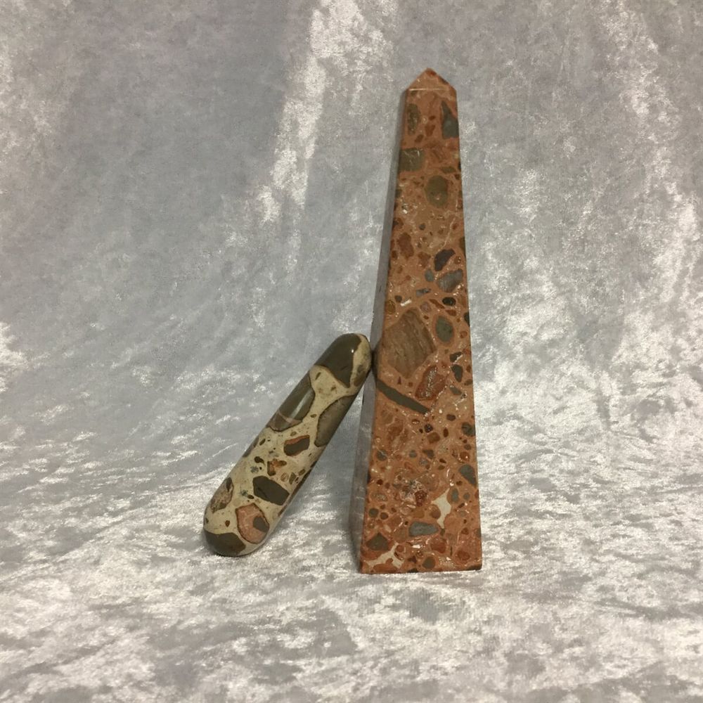 A Stone and A Wooden Object Are Placed on A Table — Crystal Cauldron In South Mackay, QLD