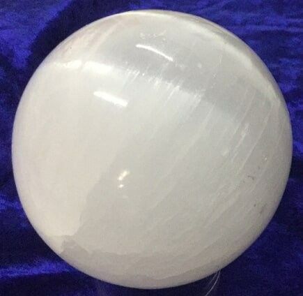 A Smooth, Translucent White Selenite Sphere — Crystal Cauldron In South Mackay, QLD