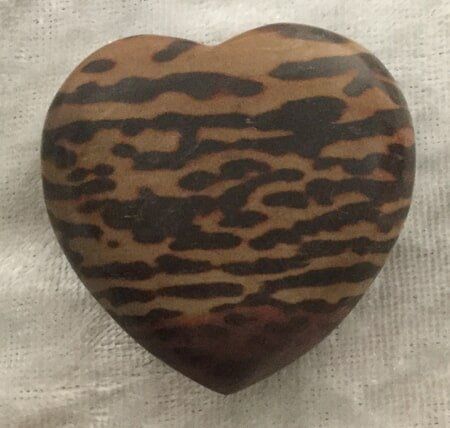 A Heart-Shaped Object Featuring a Distinctive Brown and Black Pattern — Crystal Cauldron In South Mackay, QLD