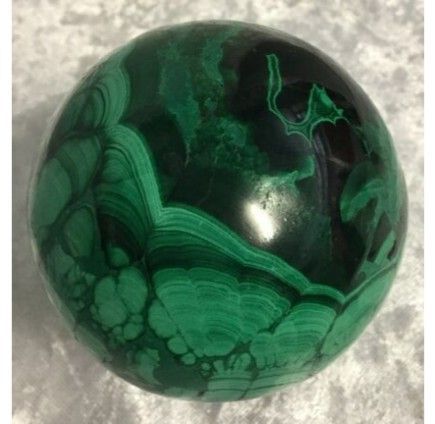 A Polished Malachite Sphere — Crystal Cauldron In South Mackay, QLD