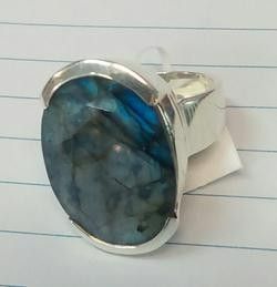 A Ring Featuring a Labradorite Stone — Crystal Cauldron In South Mackay, QLD