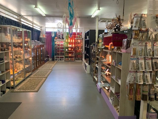 A Store Filled with Lots of Shelves — Crystal Cauldron in South Mackay, QLD
