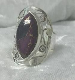 A Silver Ring Featuring a Striking Purple Stone — Crystal Cauldron In South Mackay, QLD