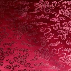 Rich Crimson Fabric Adorned with Intricate Dark Patterns — Crystal Cauldron In South Mackay, QLD