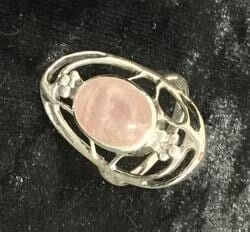A Small Piece of Pink Stone Set in A Metal Holder — Crystal Cauldron In South Mackay, QLD