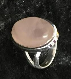 A Pink Stone Ring Set in A Sleek Silver Band — Crystal Cauldron In South Mackay, QLD