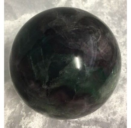 A Polished, Dark Green and Black Spherical Stone — Crystal Cauldron In South Mackay, QLD