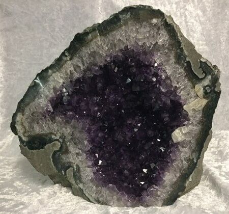 A Stunning Amethyst Geode Showcasing Vibrant Purple Crystals — Crystal Cauldron In South Mackay, QLD