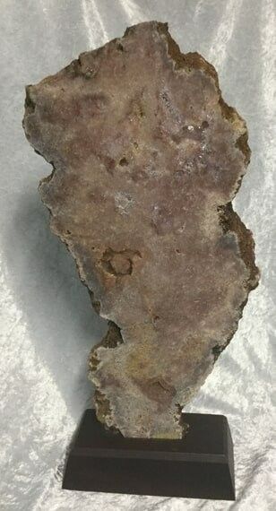 A Rough, Irregularly-Shaped Rock Slab — Crystal Cauldron In South Mackay, QLD