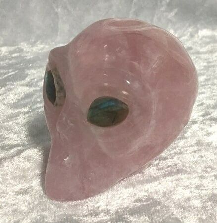 A Vibrant Pink Alien Head Adorned with Prominent Eyes — Crystal Cauldron In South Mackay, QLD