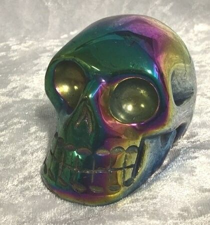 A Skull Painted in A Spectrum of Rainbow Colors — Crystal Cauldron In South Mackay, QLD