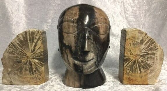 Stone Sculpture Depicting a Face — Crystal Cauldron In South Mackay, QLD