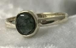 A Ring Showcasing a Vibrant Oval Green Stone — Crystal Cauldron In South Mackay, QLD