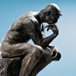A Bronze Sculpture of A Seated Male Figure — Crystal Cauldron In South Mackay, QLD