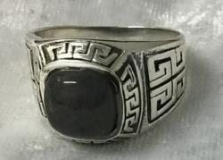 A Silver Ring with A Striking Black Stone — Crystal Cauldron In South Mackay, QLD