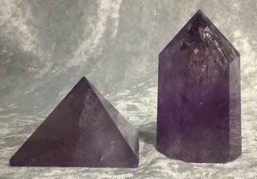 Two Purple Crystals Stacked Elegantly on Top of Each Other — Crystal Cauldron In South Mackay, QLD