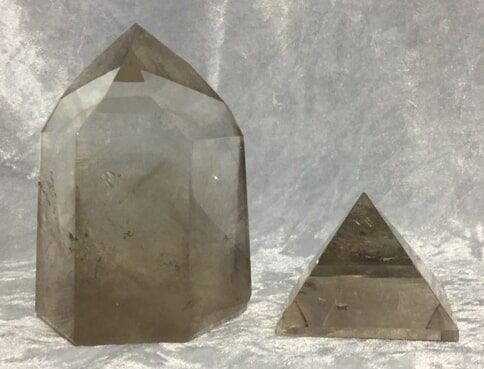 Two Large Crystal-Shaped Objects Stacked, with The Top Crystal — Crystal Cauldron In South Mackay, QLD