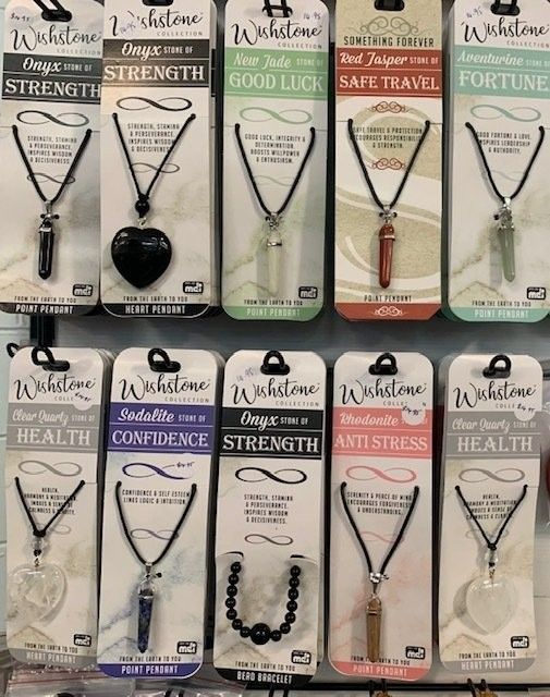 A Vibrant Display of Necklaces Showcasing Diverse Colors — Crystal Cauldron In South Mackay, QLD