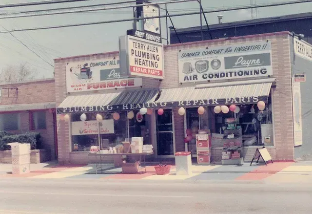 An old photo of a plumbing and air conditioning store