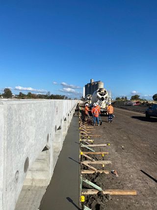 Workers Concreting Car Park Building — Concreters in Inverell