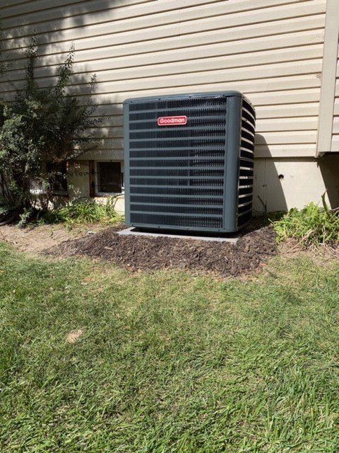 Outdoor Air Conditioned At The Backyard — De Soto, MO — Midwest Appliance Repair Heating & Cooling