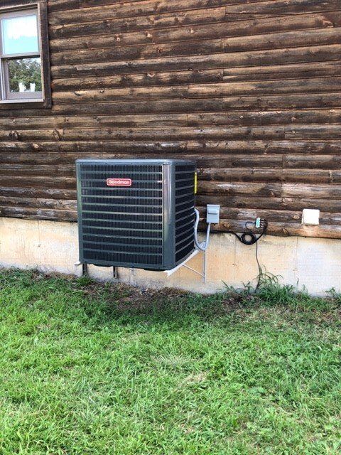Modern Outdoor Wall Cooling Aircon — De Soto, MO — Midwest Appliance Repair Heating & Cooling