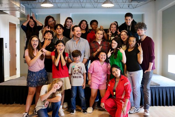 Professional acting coach mentoring students during audition training for film and television casting success