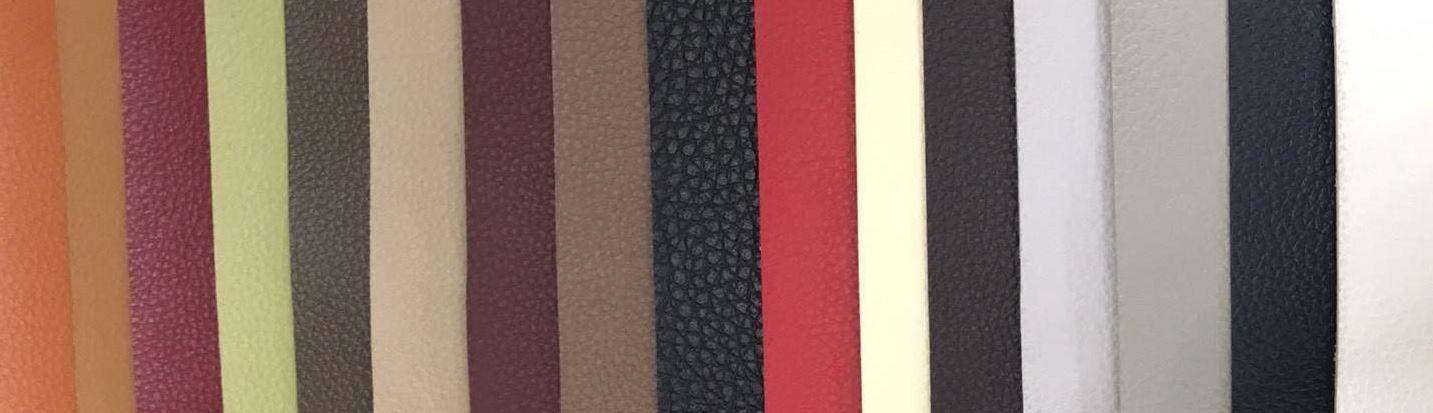 A close up of a bunch of different colored stripes on a wall.