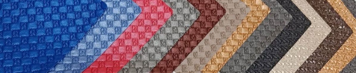 A close up of a row of different colored fabrics.