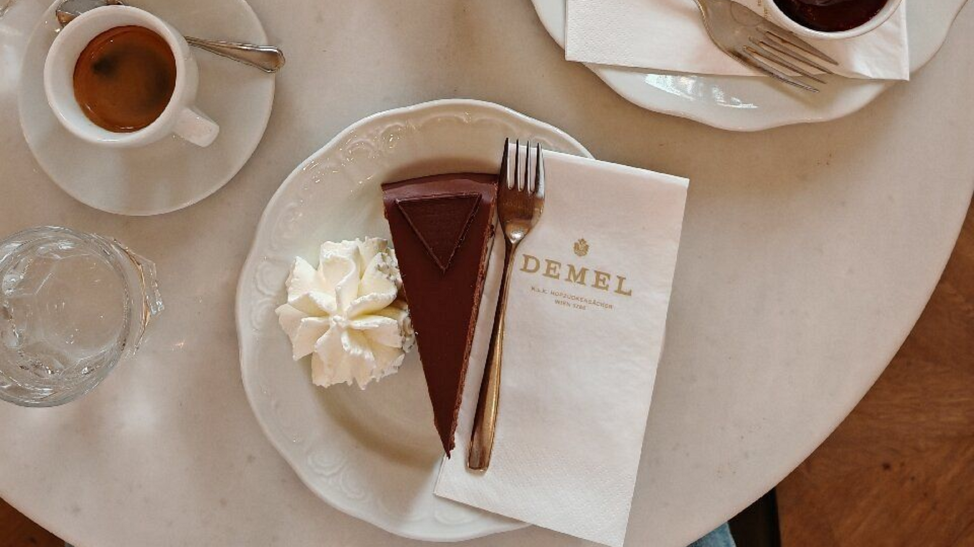 Sacher cake and coffee at Cafe Demel in Vienna